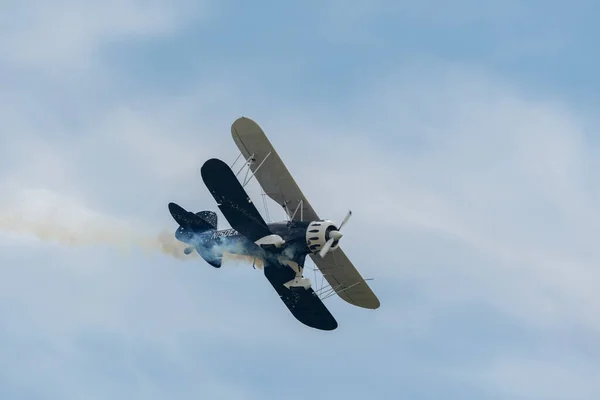 stock image Speck-Fehraltorf, Zurich, Switzerland, July 1, 2023 N-150EK Waco Typ YMF-5 acrobatic double decker aircraft is performing during an air show