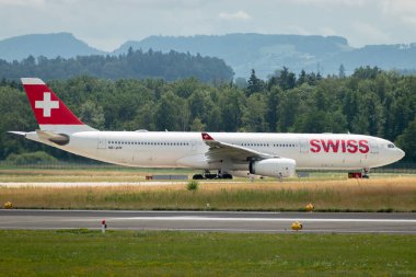 Zurich, Switzerland, July 13, 2023 HB.JHN Swiss international airlines Airbus A330-343 aircraft is taxiing to its take off position clipart