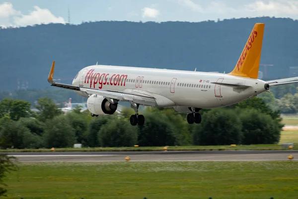 stock image Zurich, Switzerland, July 13, 2023 TC-RBL Pegasus Airbus A321-251NX Neo aircraft is landing on runway 14