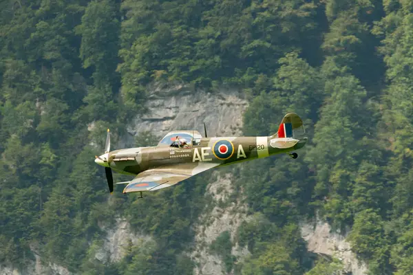 stock image Mollis, Switzerland, August 18, 2023 EP-120 Supermarine LF Mk Vb Spitfire aircraft is performing during an air show