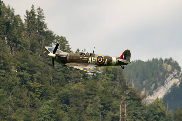 Mollis, Switzerland, August 18, 2023 EP-120 Supermarine LF Mk Vb Spitfire aircraft is performing during an air show