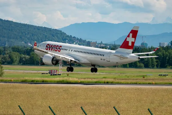 stock image Zurich, Switzerland, June 16, 2024 HB-JCP Swiss international airlines Bombardier CS-300 or Airbus A220 aircraft is landing on runway 14