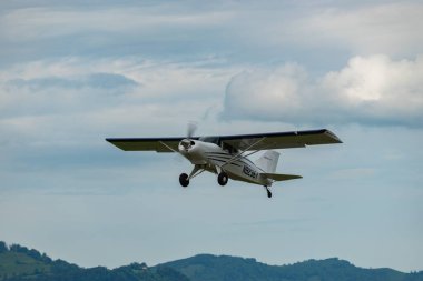 Wangen-Lachen, Switzerland, May 26, 2024 N-9236Y Maule MX-7-160 propeller plane is departing from a small airfield clipart