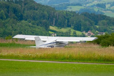 Wangen-Lachen, Switzerland, May 26, 2024 N-9236Y Maule MX-7-160 propeller plane is departing from a small airfield clipart