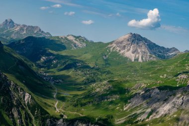 Zuers, Austria, July 30, 2024 View over the alpine Zuers area during a flight in a small propeller plane on a sunny day clipart