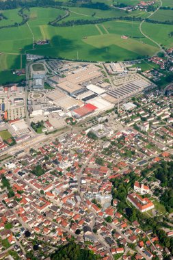 Isny, August 4, 2024 View over the downtown area during a flight in a small plane clipart