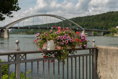 Vilshofen, Bavaria, Germany, August 4, 2024 Beautiful bridge across the Danube river in the city center clipart