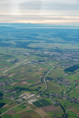 Memmingen, Germany, September 29, 2024 View over the surroundings and the local airport during a flight in a small plane clipart