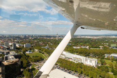 Mannheim, Germany, September 15, 2024 Flight over the city in a small airplane clipart