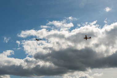 Aalen, Germany, September 29, 2024 Aerospool WT-9 Dynamic propeller plane is towing a glider at the local airfield clipart