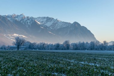 Vaduz, Liechtenstein, December 31, 2024 Alpine winter panorama on a cold day