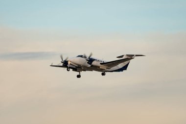 Zurich, Switzerland, January 24, 2025 F-HPGA Beech King Air 350i propeller aircraft is taking off from runway 28 during the world economic forum in Davos clipart