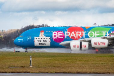 Zurich, Switzerland, January 23, 2025 A6-EEU Emirates Airbus A380-861 aircraft with special painting just landed on runway 28 clipart