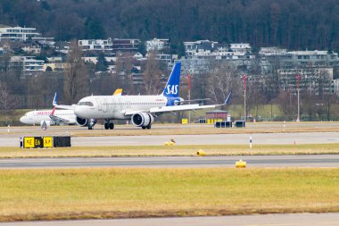 Zurich, Switzerland, January 23, 2025 SE-RUP SAS Scandinavian airlines Airbus A320-251N aircraft just landed on runway 28 clipart