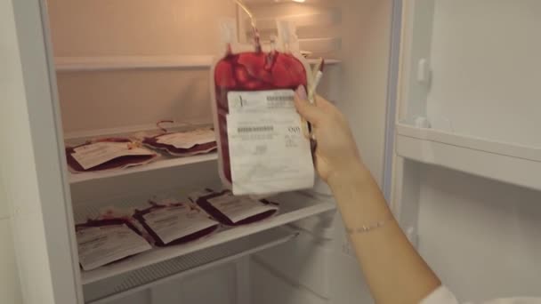Kyiv Ukraine 2023 Doctor Putting Bag Donor Blood Refrigerator Handheld — Stock Video