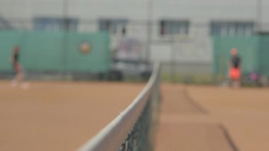 Ağır çekim. Tenis topu tenis kablosuna çarptı..