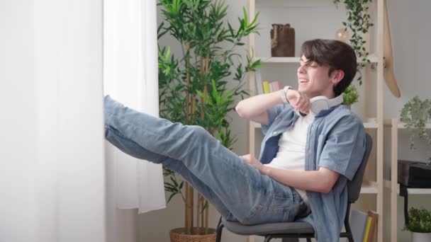 Teenager Boy Sending Voice Message Smart Watch While Relaxing Sitting — Vídeo de stock