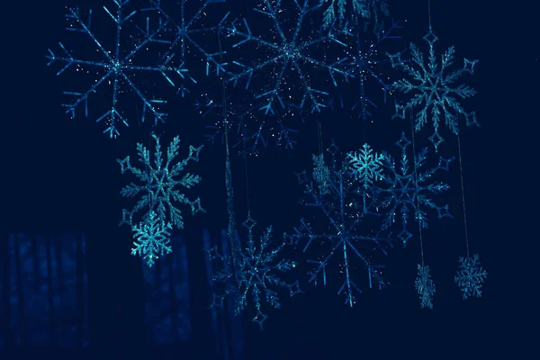Decor of snowflakes for the Christmas holiday. Snowflakes for decor. Toys for the holiday