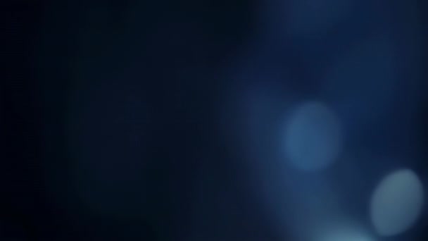 Абстрактный Темно Синий Фон Боке Искрой Плывущей Кадру Влево Черном — стоковое видео