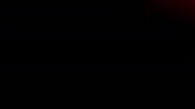 Kırmızı ışık demeti anamorfik merceklere ışık sızıntısı yaratır, Bokeh ve haleyle birlikte, sağ kenardan aşağıya hareket ederek, harmanlama efekti için siyah arkaplana doğru.