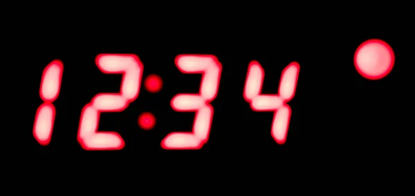 12時34分表示のデジタル時計のクローズアップ — ストック写真