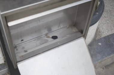 the key to the apartment is left in the mailbox on the wall of the house, the danger of robbery, High quality photo