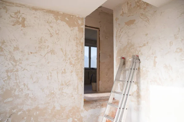 stock image an empty room in an apartment with peeling walls in need of a major overhaul. High quality photo