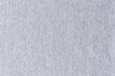 Açık gri heather kumaş dokusu arka plan olarak, dokuma deseninin karmaşık detaylarını gösterir, tekstil ve tasarım projeleri için uygundur.