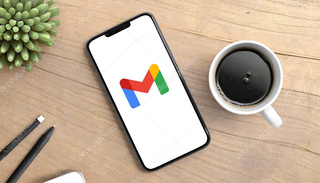 Buenos Aires, Argentina; 11-15-2023: logo of Gmail on the screen of smartphone on desk.