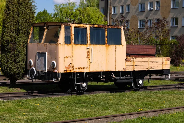 Small narrow-gauge railway draisine standing at the museum station. Monuments of technology saved from oblivion.