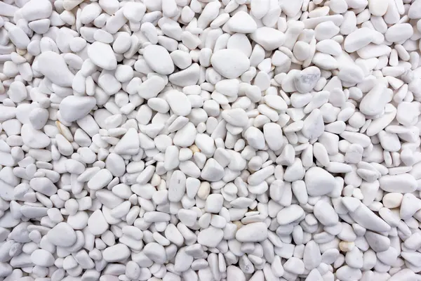 stock image Close-up for oval pebbles of white gravel stones. White gravel as a decorative and architectural ingredient. Shot taken with natural lighting.