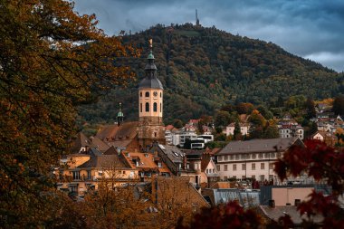 A View On a Baden Baden City Center and A Mercur Mountain on an Autumn Day clipart