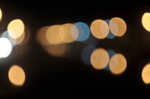 dim lights blur at night as background