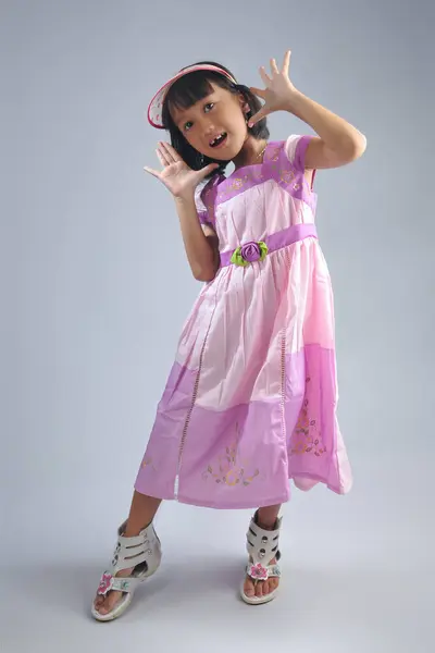 Indonesian Little Girl Wearing Fashionable Dress Modeling Pose Isolated Plain Stock Picture