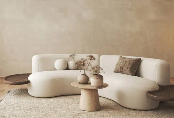 An elegant beige curved sofa with stylish decorative vases on a coffee table, embodying a minimalist and modern interior design
