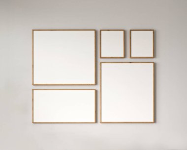 Minimalist iç tasarımın çağdaş bir gösteriminde sanat eserlerini bekleyen, bir duvarda sergilenmiş boş resim çerçeveleri.