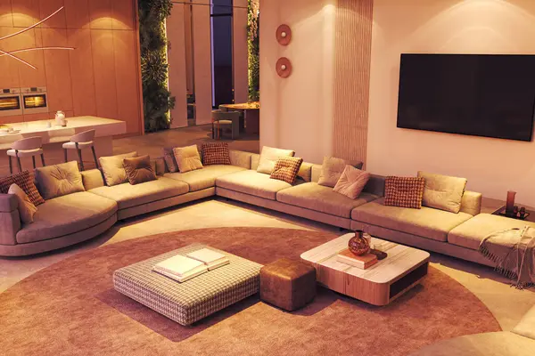 Geniş kıvrımlı bir kanepe, sıcak ortam aydınlatması, modern dekorasyon ve görünürde minimalist bir mutfak içeren açık bir konsept yaşam alanı.. 