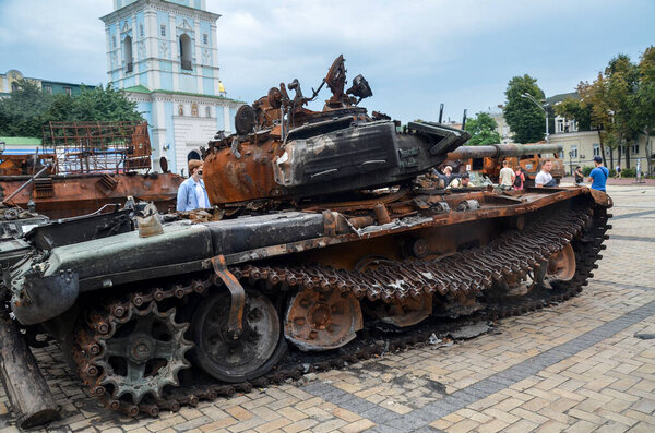 Crushed russian T-72B tank at the exhibition of destroyed russian equipment in Kyiv. 