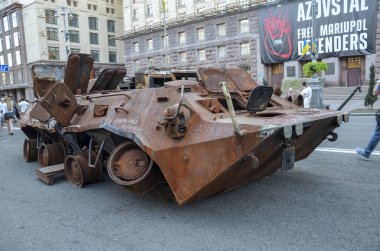 Rusty, russian combat military equipment destroyed by Ukrainian defenders on display on the main street in Kyiv