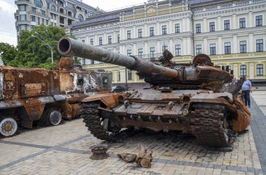 Crushed russian T-72B tank at the exhibition of destroyed russian equipment in Kyiv. 