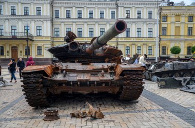 Crushed russian T-72B tank at the exhibition of destroyed russian equipment in Kyiv. 