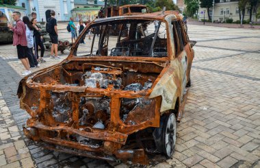 A burnt-out car destroyed as a result of shelling by Russian invaders. War in Ukraine