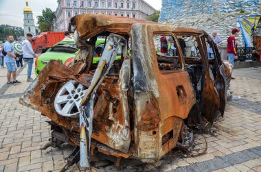 A burnt-out car destroyed as a result of shelling by Russian invaders. War in Ukraine