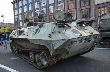 Rusty, russian combat military equipment destroyed by Ukrainian defenders on display on the main street in Kyiv