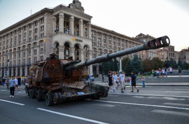 Destroyed russian 2S19 'Msta-S' Self-Propelled Mortar exhibited with other crushed Russian military vehicles on Khreshchatyk street in center of Kyiv