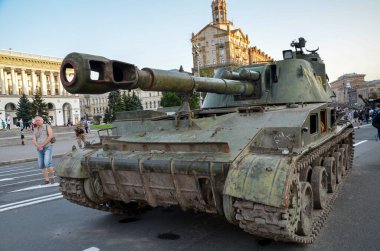 Rusty, russian combat military equipment destroyed by Ukrainian defenders on display on the main street in Kyiv
