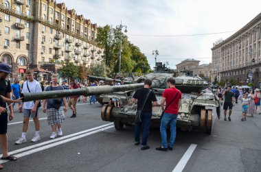 Ukrainians visit Khreshchatyk street in Kyiv where destroyed Russian tanks and military vehicles have been displayed