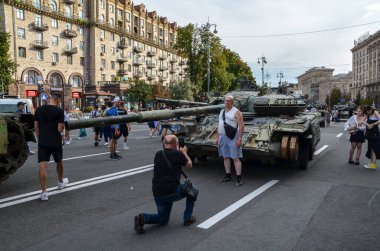 Ukrainians visit Khreshchatyk street in Kyiv where destroyed Russian tanks and military vehicles have been displayed