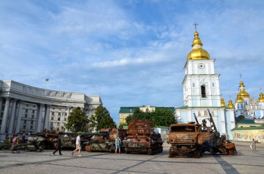 People visit an exhibition of destroyed Russian military vehicles and weapons in Kyiv