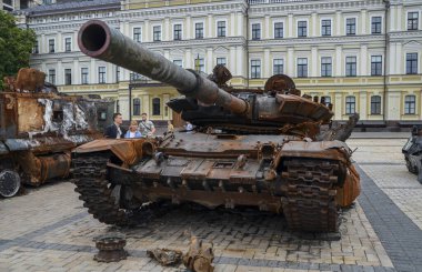 Crushed russian T-72B tank at the exhibition of destroyed russian equipment in Kyiv